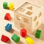 Melissa & Doug Shape Sorting Cube - Classic Wooden Toy With 12 Shapes - Kids Shape Sorter Toys For Toddlers Ages 2+ - Image 6