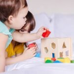 Melissa & Doug Shape Sorting Cube - Classic Wooden Toy With 12 Shapes - Kids Shape Sorter Toys For Toddlers Ages 2+ - Image 4